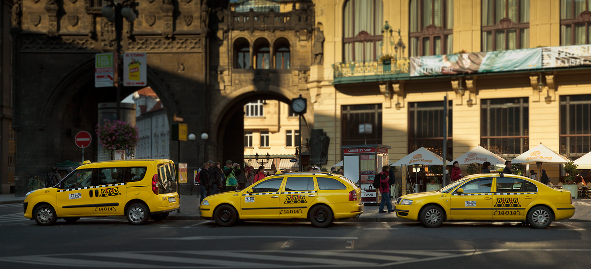 three yellow taxis
